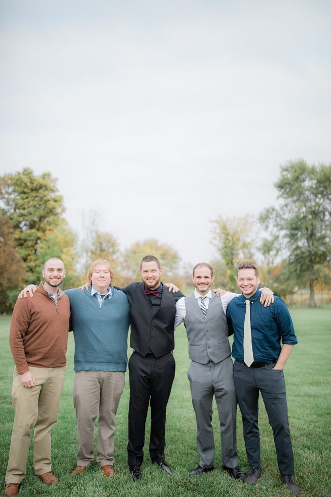 formal portrait of the groom and his friends
