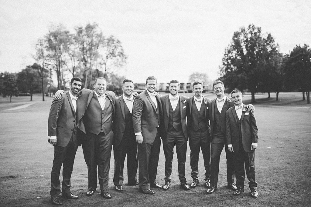 black and white groomsmen portrait