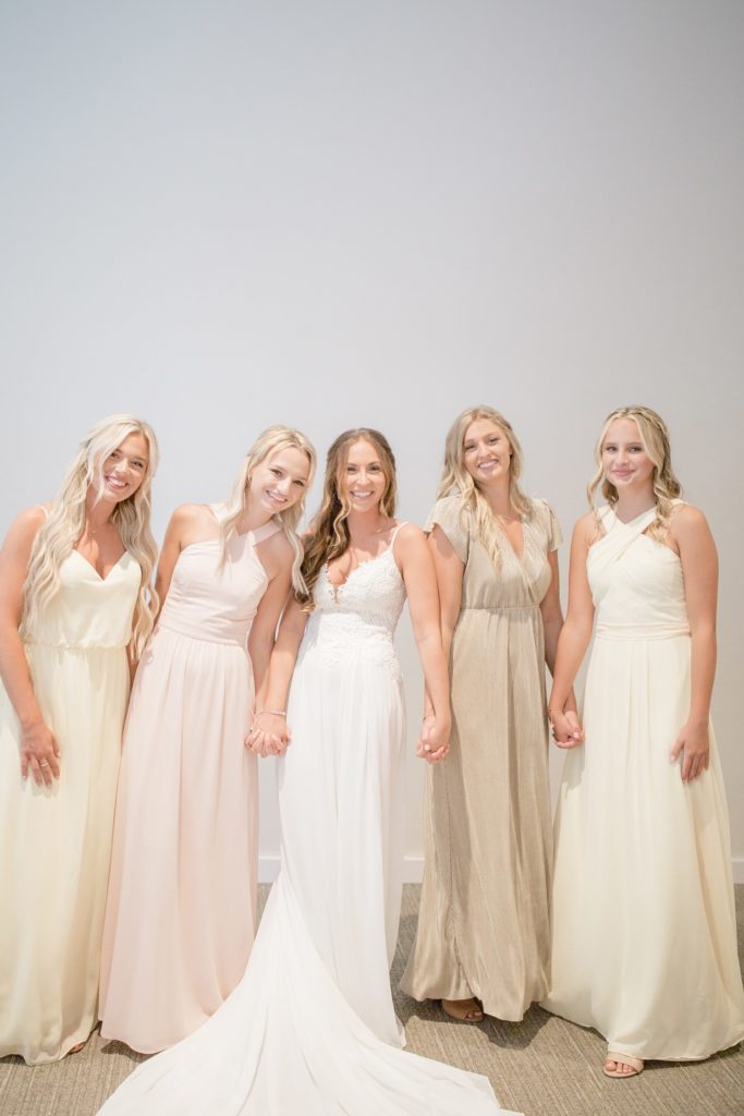 bride and her maid of honor and sisters