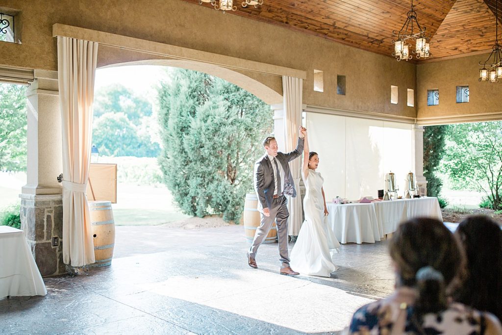 bride and groom entering reception at Gervasi