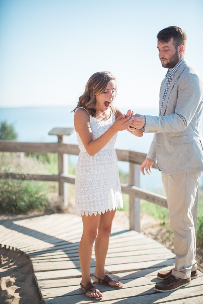 candid photograph of surprise proposal