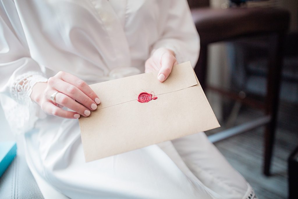 groom's letter to bride with a wax seal