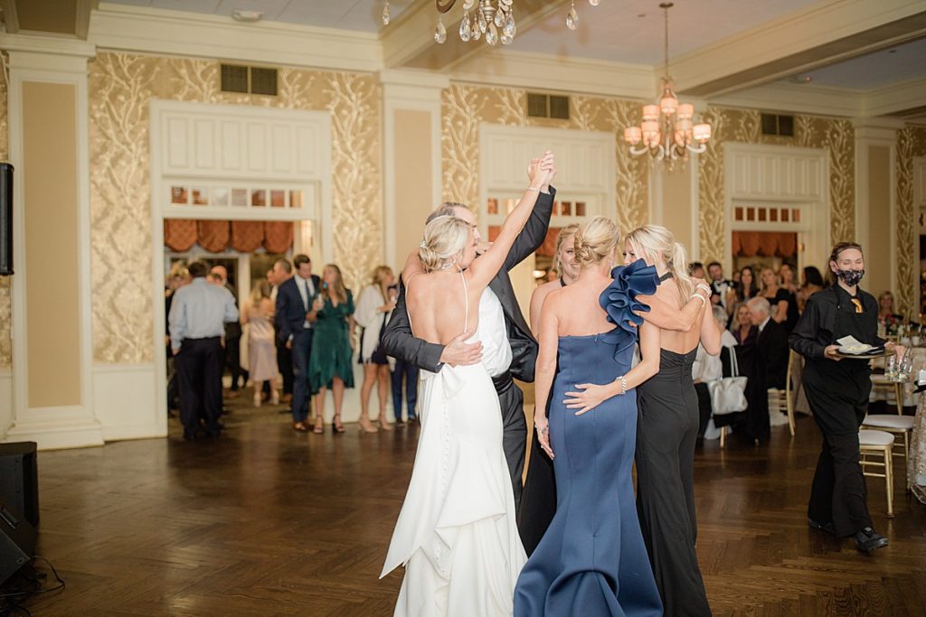 guests dancing during wedding reception