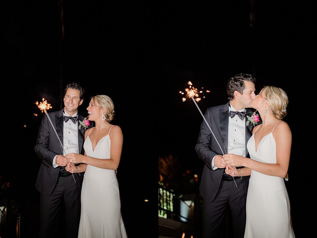 bride and groom on terrace with sparklers