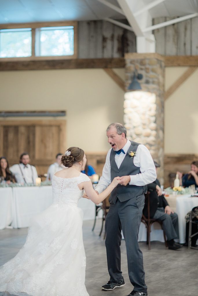 bride dancing with father in law