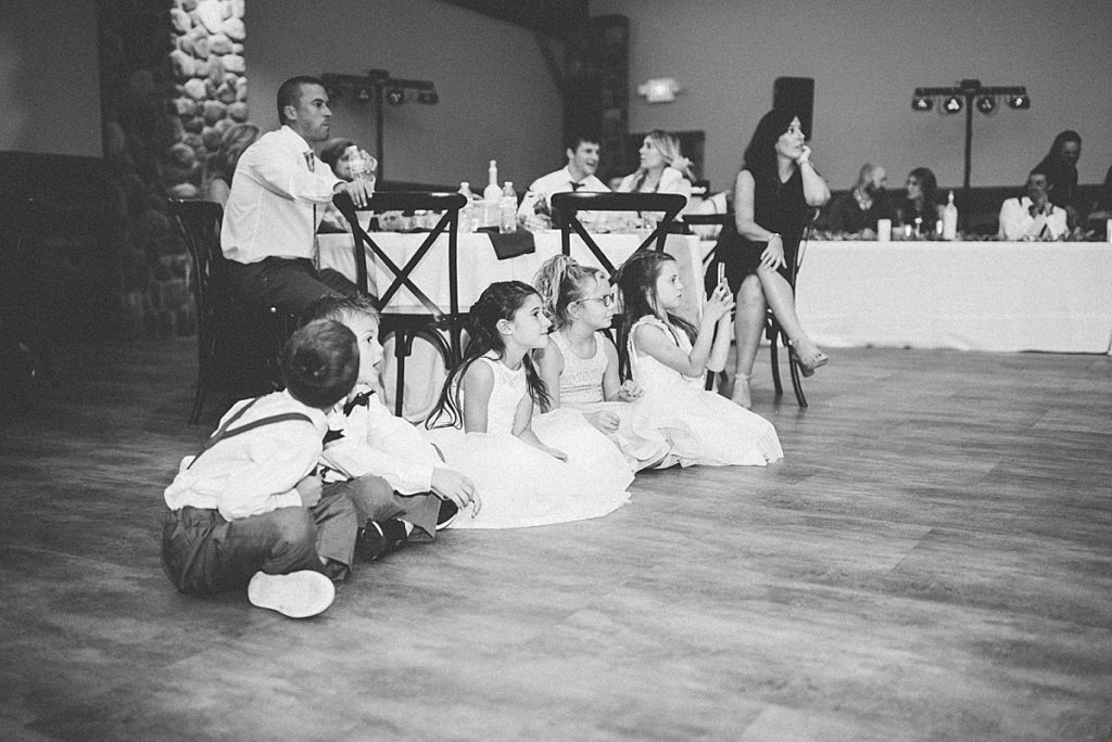 children watching the bride dance