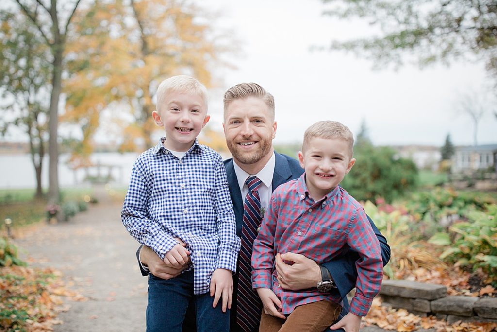 formal portrait of groom and his sons