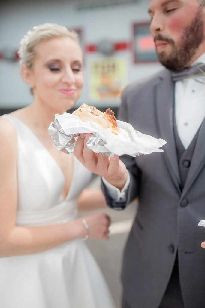 Bride and Groom eating a Swenson's Burger