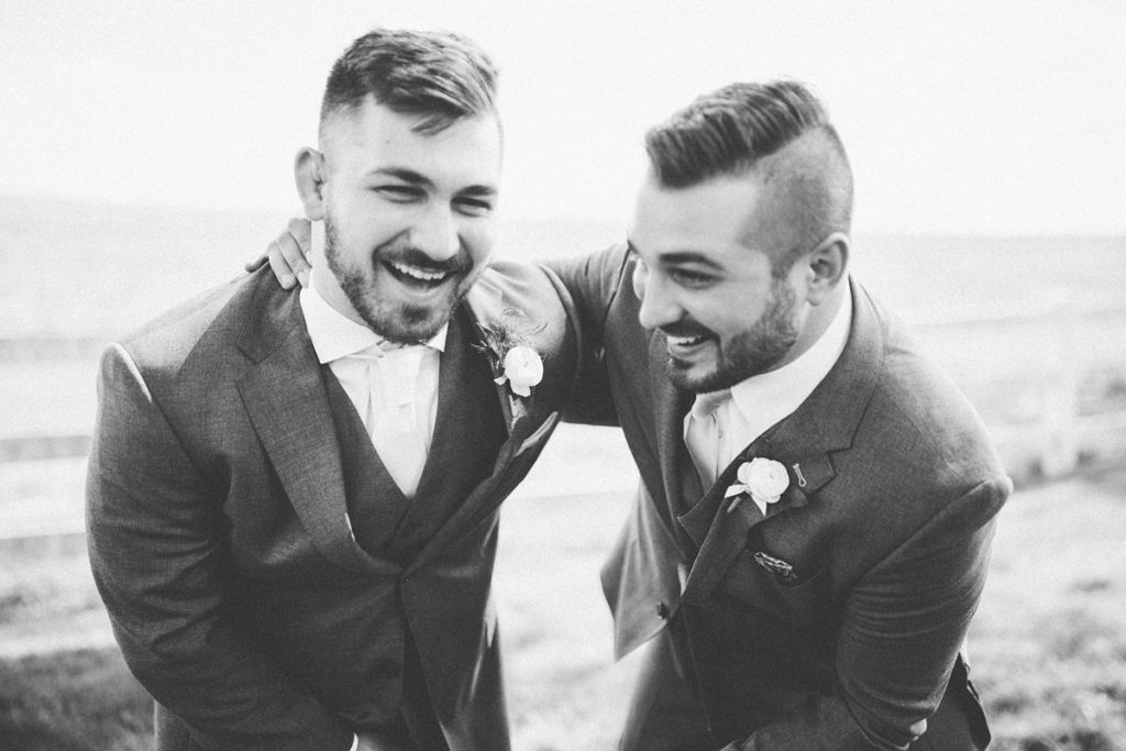 groom candid moment with brother