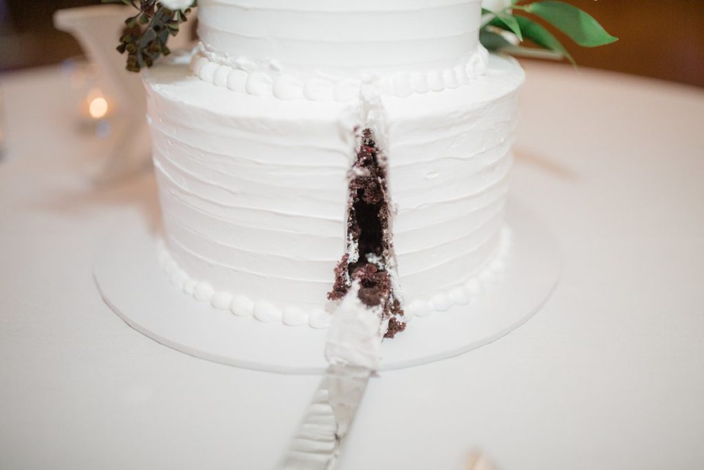 detail shot of the cake being cut