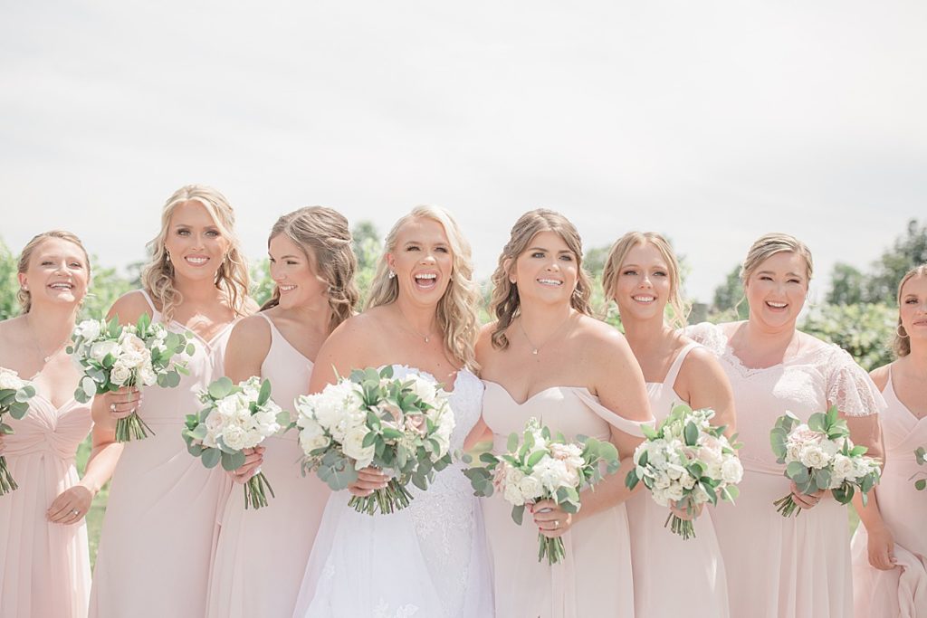 candid shot of the bride and her bridesmaids