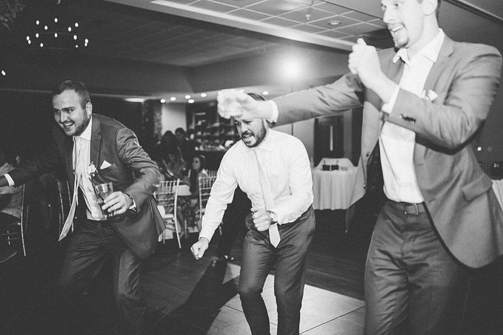 candid guests dancing during reception