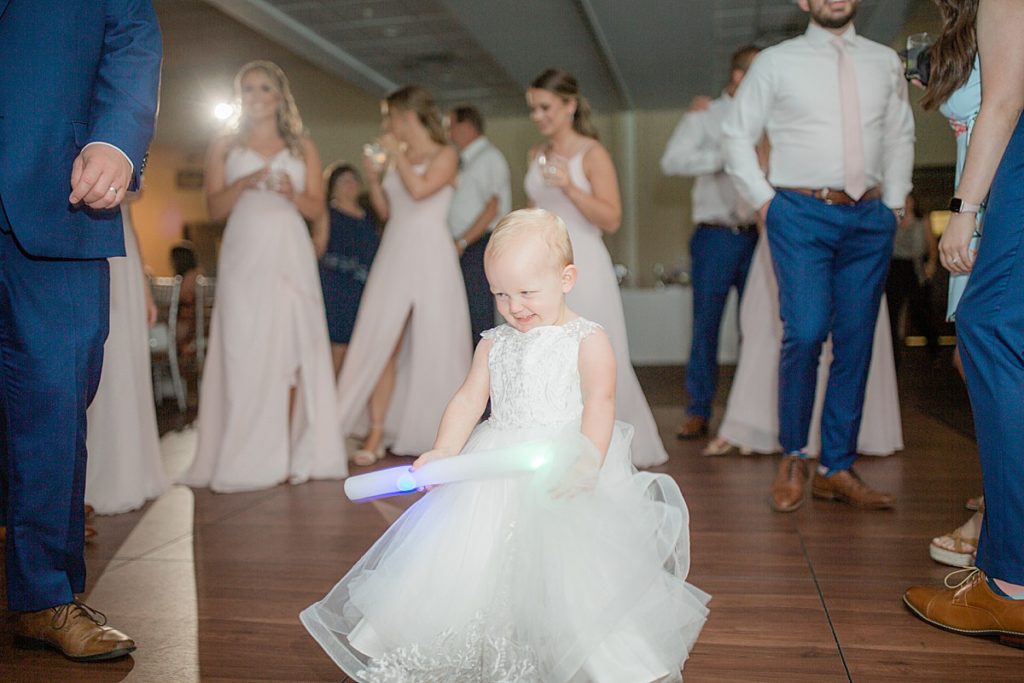 flower girl dancing with lights