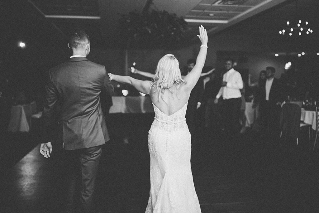 candid guests dancing during reception