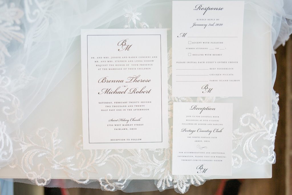 Wedding Invitations on top of the veil